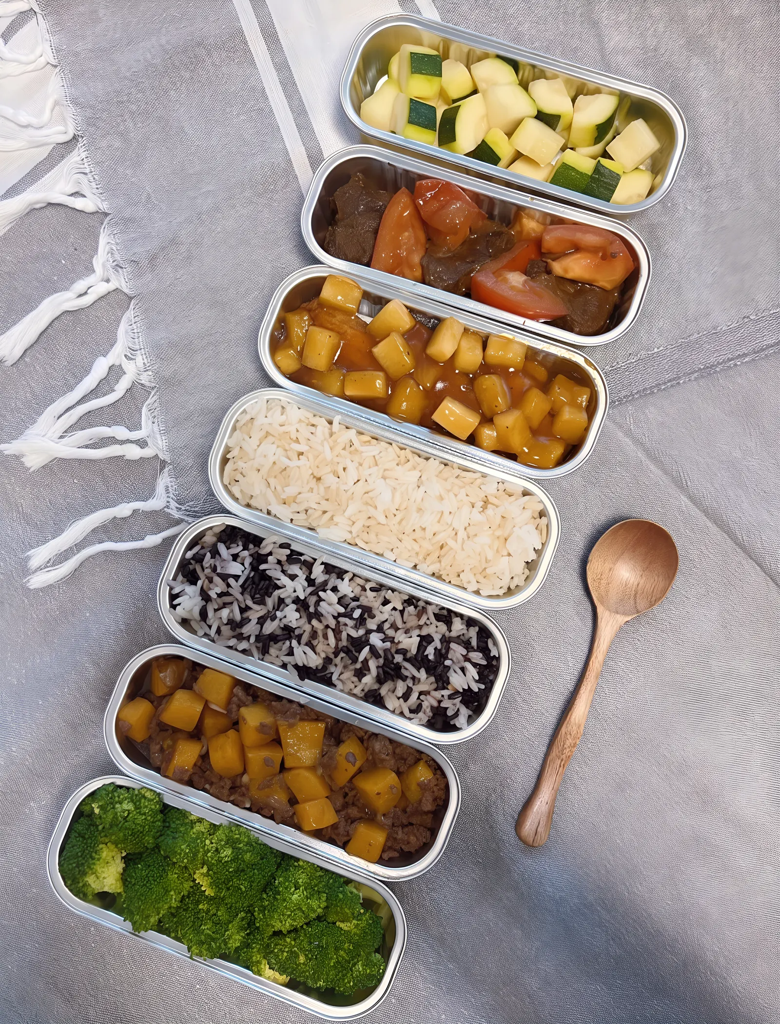 A week of Me Time Meal single-portion bento boxes from Julia's Kitchen in Richmond, BC: seven home-style Cantonese meals with less oil and salt, delivered across Greater Vancouver